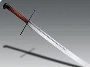 Long sword with wooden handle and shadow.