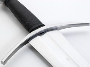 Sword with black handle and silver guard.