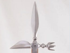 Ornate metal spear with unique blade design.