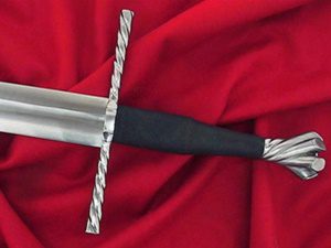 Longsword with twisted hilt on red cloth
