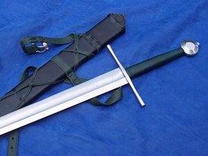 Steel longsword with leather scabbard on blue