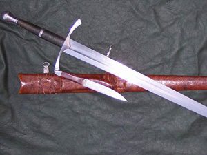 Sword and knife with leather sheath.