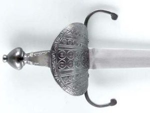 Ornate sword with decorative hilt design.