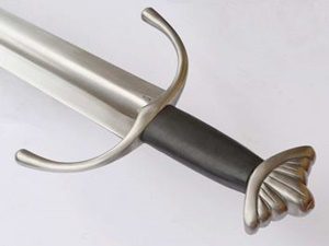 Medieval sword with curved guard and pommel.