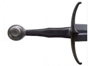 Medieval sword hilt with curved guard.