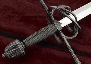 Sword hilt with intricate wire-wrapped design.
