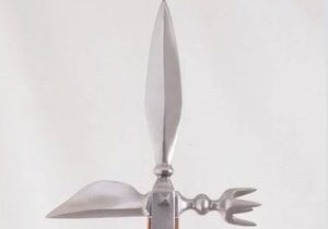 Ornate metal spear with unique blade design.