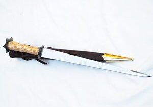 Knife with sheath on white background.