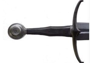 Medieval sword hilt with curved guard.